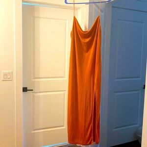 Orange midi shimmery dress with spaghetti straps. By Petal + Pup. US 12/UK 16.